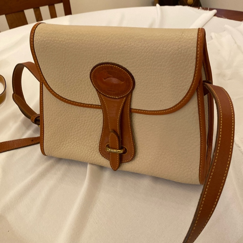 Dooney & Bourke leather. 9” x 9”